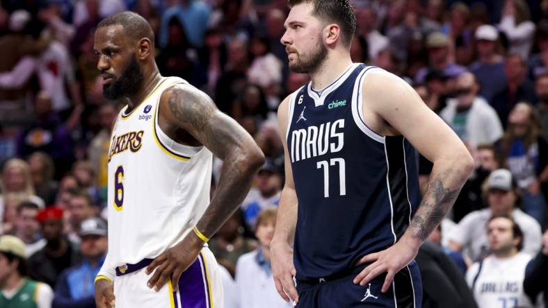 Feb 26, 2023; Dallas, Texas, USA; Los Angeles Lakers forward LeBron James (6) and Dallas Mavericks guard Luka Doncic (77) during the fourth quarter at American Airlines Center. Mandatory Credit: Kevin Jairaj-USA TODAY Sports