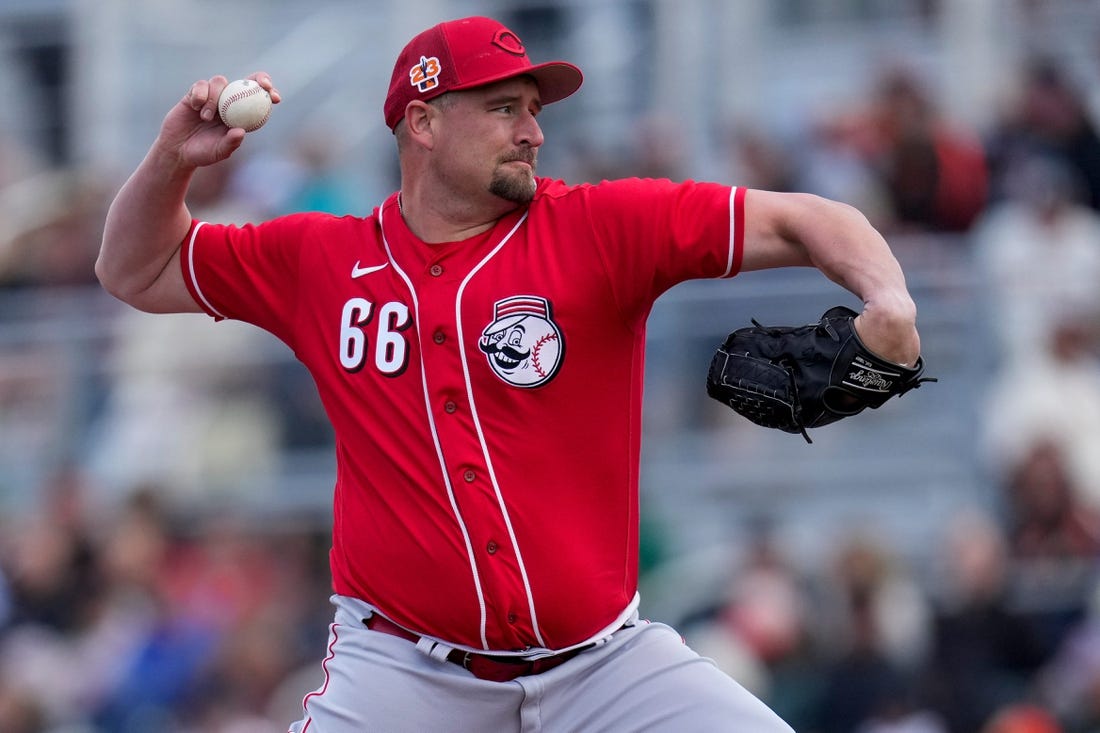 Cincinnati Reds relief pitcher Joel Kuhnel (66) throws a pith in the fifth inning of the MLB Cactus League spring training game between the San Francisco Giants and the Cincinnati Reds at Scottsdale Stadium in Goodyear, Ariz., on Sunday, Feb. 26, 2023. The Giants came back in the ninth inning to win on a walk-off single off the bat of Will Wilson.

Cincinnati Reds At San Francisco Giants Spring Training