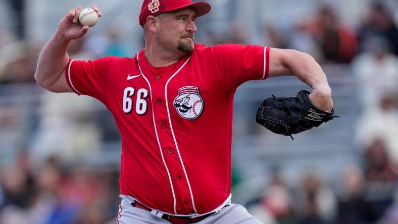 Cincinnati Reds relief pitcher Joel Kuhnel (66) throws a pith in the fifth inning of the MLB Cactus League spring training game between the San Francisco Giants and the Cincinnati Reds at Scottsdale Stadium in Goodyear, Ariz., on Sunday, Feb. 26, 2023. The Giants came back in the ninth inning to win on a walk-off single off the bat of Will Wilson.

Cincinnati Reds At San Francisco Giants Spring Training