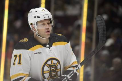 Feb 25, 2023; Vancouver, British Columbia, CAN;  Boston Bruins forward Taylor Hall (71) skates between play during the third period against the Vancouver Canucks at Rogers Arena. Mandatory Credit: Anne-Marie Sorvin-USA TODAY Sports