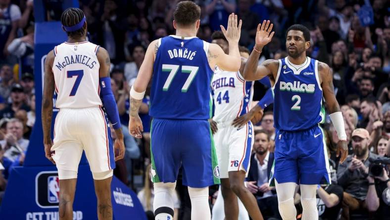 Mar 2, 2023; Dallas, Texas, USA;  Dallas Mavericks guard Kyrie Irving (2) celebrates with Dallas Mavericks guard Luka Doncic (77) during the second half against the Philadelphia 76ers at American Airlines Center. Mandatory Credit: Kevin Jairaj-USA TODAY Sports