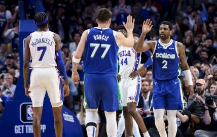 Mar 2, 2023; Dallas, Texas, USA;  Dallas Mavericks guard Kyrie Irving (2) celebrates with Dallas Mavericks guard Luka Doncic (77) during the second half against the Philadelphia 76ers at American Airlines Center. Mandatory Credit: Kevin Jairaj-USA TODAY Sports