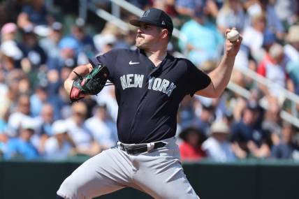 Mar 5, 2023; North Port, Florida, USA; New York Yankees starting pitcher Carlos Rodon (55) throws a pitch during the first inning against the Atlanta Braves at CoolToday Park. Mandatory Credit: Kim Klement-USA TODAY Sports