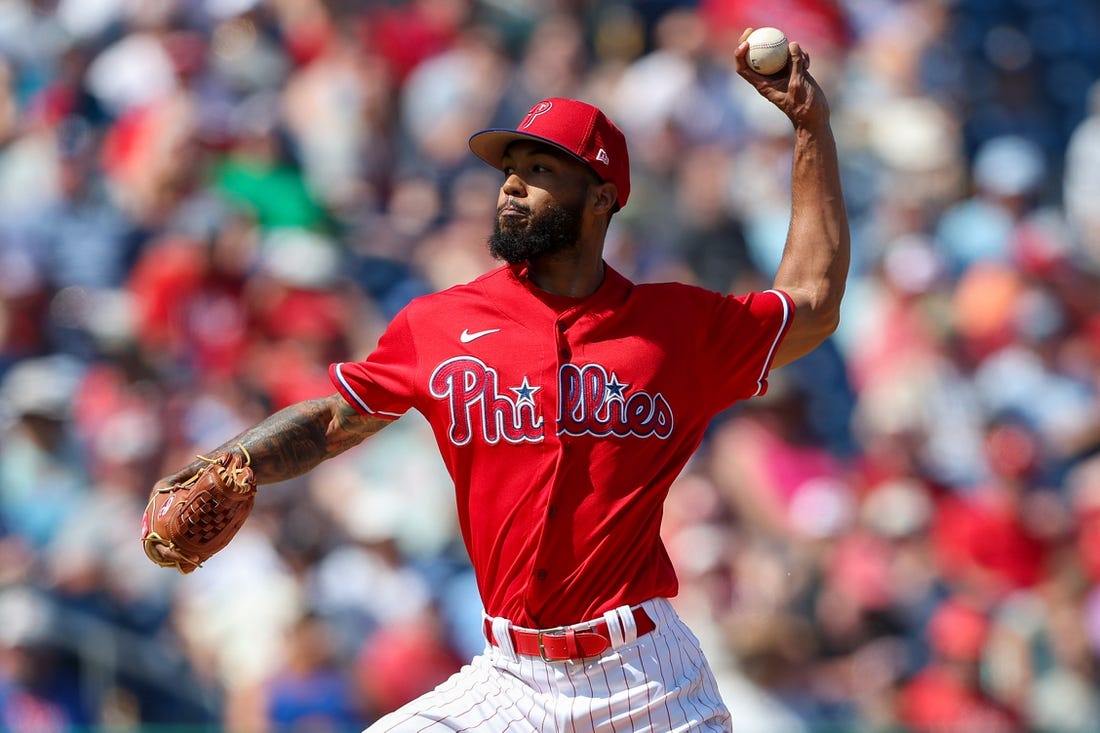 Mar 7, 2023; Clearwater, Florida, USA;  Philadelphia Phillies relief pitcher Cristopher Sanchez (61) throws a pitch against the Tampa Bay Rays in the fourth inning during spring training at BayCare Ballpark. Mandatory Credit: Nathan Ray Seebeck-USA TODAY Sports