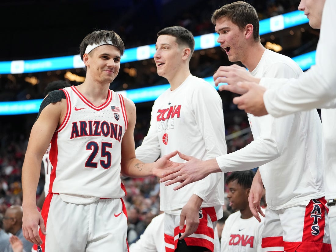 Mar 9, 2023; Las Vegas, NV, USA; Arizona Wildcats guard Kerr Kriisa (25) returns to the bench after a shift against the Stanford Cardinal during the second half at T-Mobile Arena. Mandatory Credit: Stephen R. Sylvanie-USA TODAY Sports