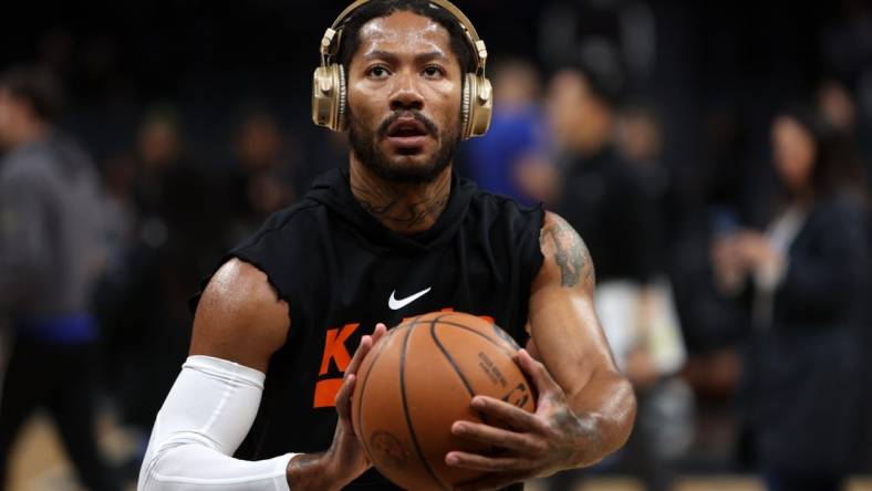 Mar 11, 2023; Los Angeles, California, USA;  New York Knicks guard Derrick Rose (4) warms up before the game against the Los Angeles Clippers at Crypto.com Arena. Mandatory Credit: Kiyoshi Mio-USA TODAY Sports