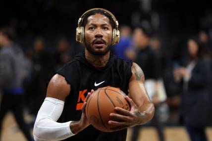 Mar 11, 2023; Los Angeles, California, USA;  New York Knicks guard Derrick Rose (4) warms up before the game against the Los Angeles Clippers at Crypto.com Arena. Mandatory Credit: Kiyoshi Mio-USA TODAY Sports
