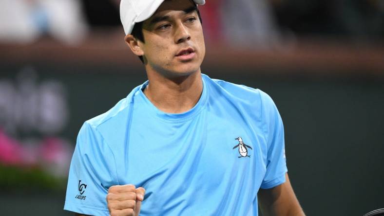 Mar 11, 2023; Indian Wells, CA, USA; Mackenzie McDonald (USA) celebrates after winning a point during his second round match against Holger Rune (DEN) during the BNP Paribas Open at Indian Wells Tennis Garden. Mandatory Credit: Jonathan Hui-USA TODAY Sports