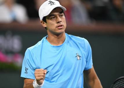 Mar 11, 2023; Indian Wells, CA, USA; Mackenzie McDonald (USA) celebrates after winning a point during his second round match against Holger Rune (DEN) during the BNP Paribas Open at Indian Wells Tennis Garden. Mandatory Credit: Jonathan Hui-USA TODAY Sports