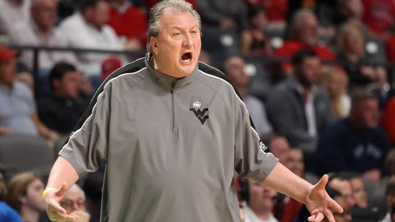 Mar 16, 2023; Birmingham, AL, USA; West Virginia Mountaineers head coach Bob Huggins reacts against the Maryland Terrapins during the first half in the first round of the 2023 NCAA Tournament at Legacy Arena. Mandatory Credit: Vasha Hunt-USA TODAY Sports