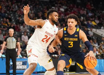 Mar 16, 2023; Birmingham, AL, USA; West Virginia Mountaineers forward Tre Mitchell (3) dribbles against Maryland Terrapins forward Donta Scott (24) during the first half in the first round of the 2023 NCAA Tournament at Legacy Arena. Mandatory Credit: Marvin Gentry-USA TODAY Sports
