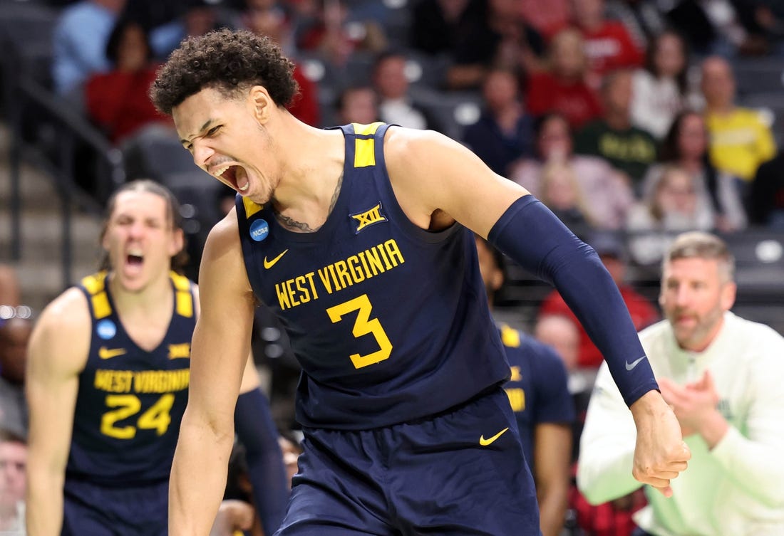 Mar 16, 2023; Birmingham, AL, USA; West Virginia Mountaineers forward Tre Mitchell (3) reacts after scoring a basket while being fouled against the Maryland Terrapins during the second half in the first round of the 2023 NCAA Tournament at Legacy Arena. Mandatory Credit: Vasha Hunt-USA TODAY Sports