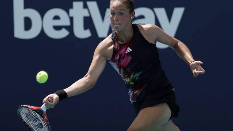 Mar 23, 2023; Miami, Florida, US; Daria Kasatkina hits a forehand against Elise Mertens (BEL) (not pictured) on day four of the Miami Open at Hard Rock Stadium. Mandatory Credit: Geoff Burke-USA TODAY Sports