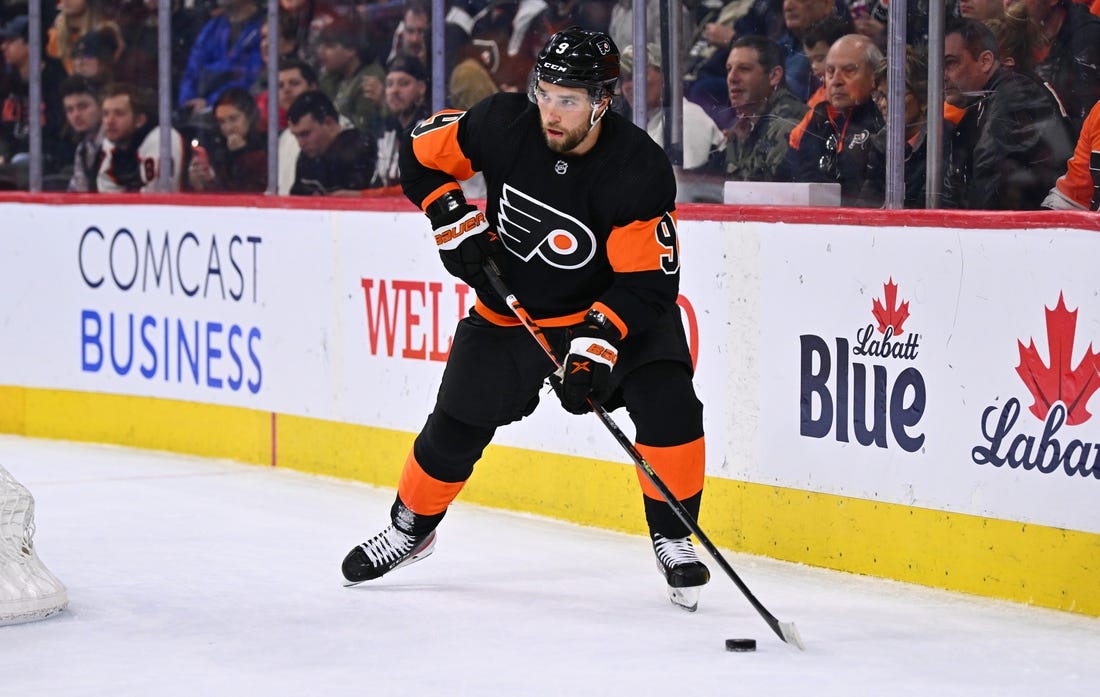 Mar 23, 2023; Philadelphia, Pennsylvania, USA; Philadelphia Flyers defenseman Ivan Provorov (9) controls the puck against the Minnesota Wild in overtime at Wells Fargo Center. Mandatory Credit: Kyle Ross-USA TODAY Sports