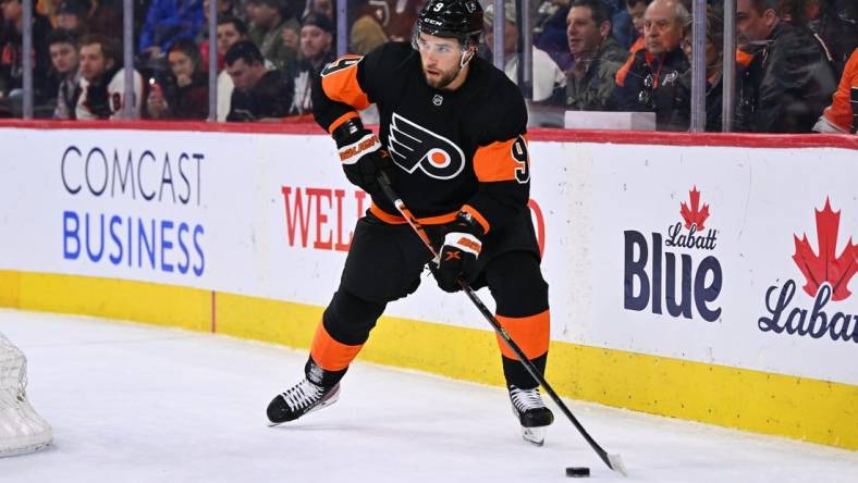 Mar 23, 2023; Philadelphia, Pennsylvania, USA; Philadelphia Flyers defenseman Ivan Provorov (9) controls the puck against the Minnesota Wild in overtime at Wells Fargo Center. Mandatory Credit: Kyle Ross-USA TODAY Sports