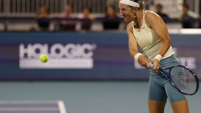 Mar 23, 2023; Miami, Florida, US; Victoria Azarenka hits a backhand against Camila Giorgi (ITA) (not pictured) on day four of the Miami Open at Hard Rock Stadium. Mandatory Credit: Geoff Burke-USA TODAY Sports