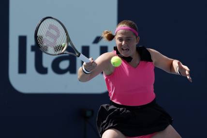 Mar 27, 2023; Miami, Florida, US; Jelena Ostapenko (LAT) hits a forehand against Martina Trevisan (ITA) (not pictured) on day eight of the Miami Open at Hard Rock Stadium. Mandatory Credit: Geoff Burke-USA TODAY Sports