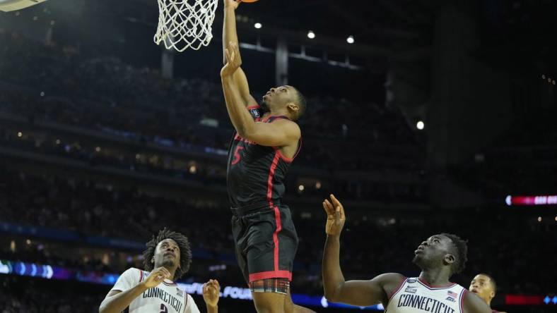 Apr 3, 2023; Houston, TX, USA; San Diego State Aztecs guard Lamont Butler (5) shoots the ball against the Connecticut Huskies during the second half in the national championship game of the 2023 NCAA Tournament at NRG Stadium. Mandatory Credit: Bob Donnan-USA TODAY Sports