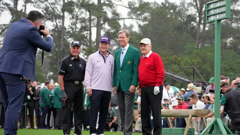 Apr 6, 2023; Augusta, Georgia, USA; Honorary starters Gary Player (left) and Tom Watson (center) and Jack Nicklaus (right) pose for a photo with Augusta National Golf Club chairman Fred Ridley before the first round of The Masters golf tournament. Mandatory Credit: Kyle Terada-USA TODAY Network