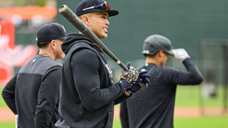 Apr 7, 2023; Baltimore, Maryland, USA;  New York Yankees designated hitter Giancarlo Stanton (27) stands on the field before the game against the Baltimore Orioles at Oriole Park at Camden Yards. Mandatory Credit: Tommy Gilligan-USA TODAY Sports