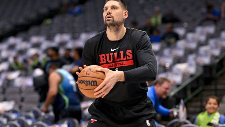 Apr 7, 2023; Dallas, Texas, USA; Chicago Bulls center Nikola Vucevic (9) warms up before the game against the Dallas Mavericks at the American Airlines Center. Mandatory Credit: Jerome Miron-USA TODAY Sports