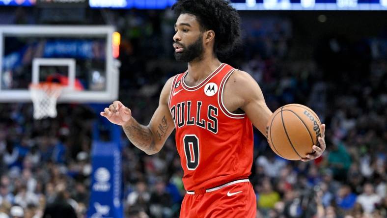 Apr 7, 2023; Dallas, Texas, USA; Chicago Bulls guard Coby White (0) brings the ball up court against the Dallas Mavericks during the first half at the American Airlines Center. Mandatory Credit: Jerome Miron-USA TODAY Sports