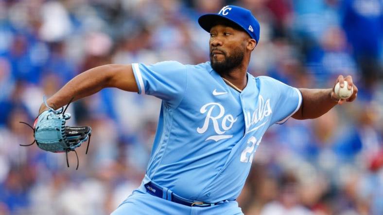 Mar 30, 2023; Kansas City, Missouri, USA; Kansas City Royals relief pitcher Amir Garrett (22) pitches during the sixth inning against the Minnesota Twins at Kauffman Stadium. Mandatory Credit: Jay Biggerstaff-USA TODAY Sports