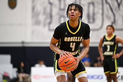 Apr 7, 2023; Washington, DC, USA; Roselle Catholic (NJ) guard Simeon Wilcher (4) shoots a free throw during the second quarter against Wheeler (GA) at Georgetown University. Mandatory Credit: Reggie Hildred-USA TODAY Sports