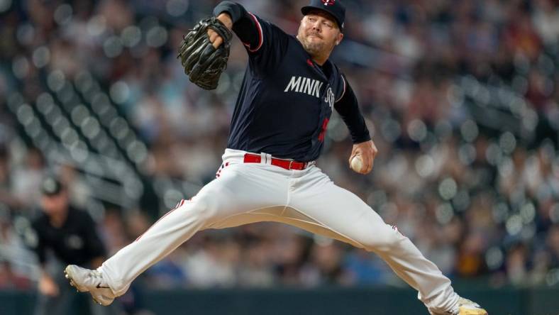 Apr 11, 2023; Minneapolis, Minnesota, USA; Minnesota Twins relief pitcher Caleb Thielbar (56) pitches to the Chicago White Sox in the eighth inning at Target Field. Mandatory Credit: Matt Blewett-USA TODAY Sports