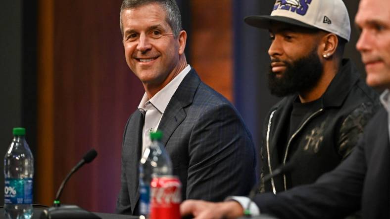 Apr 13, 2023; Owings Mills, MD, USA; Baltimore Ravens wide receiver Odell Beckham Jr. (M), head coach John Harbaugh (L), and executive vice president & general manager Eric DeCosta (R) speak to media at his introduction press conference at Under Armour Performance Center. Mandatory Credit: Reggie Hildred-USA TODAY Sports