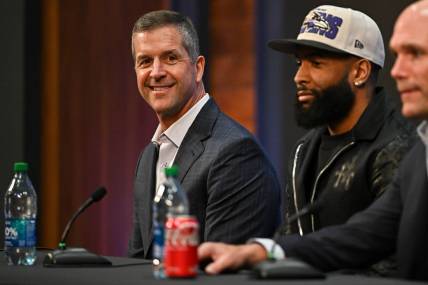 Apr 13, 2023; Owings Mills, MD, USA; Baltimore Ravens wide receiver Odell Beckham Jr. (M), head coach John Harbaugh (L), and executive vice president & general manager Eric DeCosta (R) speak to media at his introduction press conference at Under Armour Performance Center. Mandatory Credit: Reggie Hildred-USA TODAY Sports