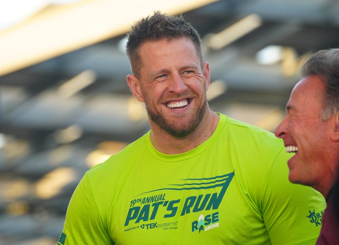 Former Arizona Cardinals defensive end J.J. Watt speaks with the press during Pat   s Run 2023 outside Sun Devil Stadium in Tempe.

Running Pat S Run J J Watt