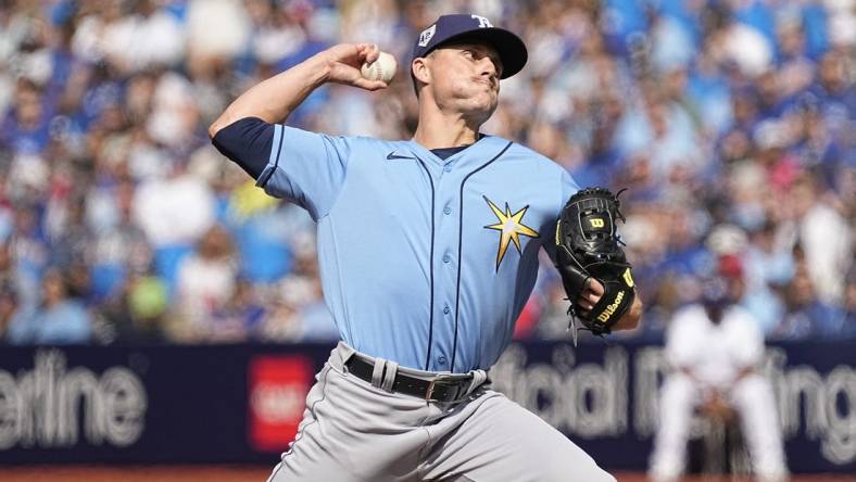 Apr 15, 2023; Toronto, Ontario, CAN; Tampa Bay Rays pitcher Calvin Faucher pitches to  to the Toronto Blue Jays during the first inning on Jackie Robinson day at Rogers Centre. Mandatory Credit: John E. Sokolowski-USA TODAY Sports