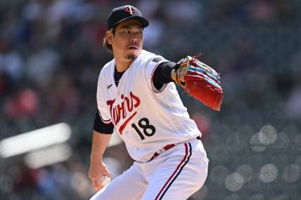 Apr 10, 2023; Minneapolis, Minnesota, USA; Minnesota Twins starting pitcher Kenta Maeda (18) throws a pitch against the Chicago White Sox during the first inning at Target Field. Mandatory Credit: Jeffrey Becker-USA TODAY Sports