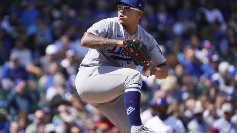 Apr 21, 2023; Chicago, Illinois, USA; Los Angeles Dodgers starting pitcher Julio Urias (7) throws the ball against the Chicago Cubs during the first inning at Wrigley Field. Mandatory Credit: David Banks-USA TODAY Sports