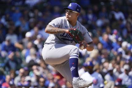 Apr 21, 2023; Chicago, Illinois, USA; Los Angeles Dodgers starting pitcher Julio Urias (7) throws the ball against the Chicago Cubs during the first inning at Wrigley Field. Mandatory Credit: David Banks-USA TODAY Sports