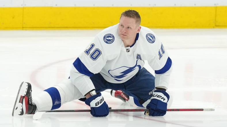 Apr 20, 2023; Toronto, Ontario, CAN; Tampa Bay Lightning right wing Corey Perry (10) stretches during the warmup against the Toronto Maple Leafs before game two of the first round of the 2023 Stanley Cup Playoffs at Scotiabank Arena. Mandatory Credit: Nick Turchiaro-USA TODAY Sports