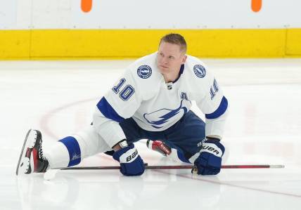 Apr 20, 2023; Toronto, Ontario, CAN; Tampa Bay Lightning right wing Corey Perry (10) stretches during the warmup against the Toronto Maple Leafs before game two of the first round of the 2023 Stanley Cup Playoffs at Scotiabank Arena. Mandatory Credit: Nick Turchiaro-USA TODAY Sports