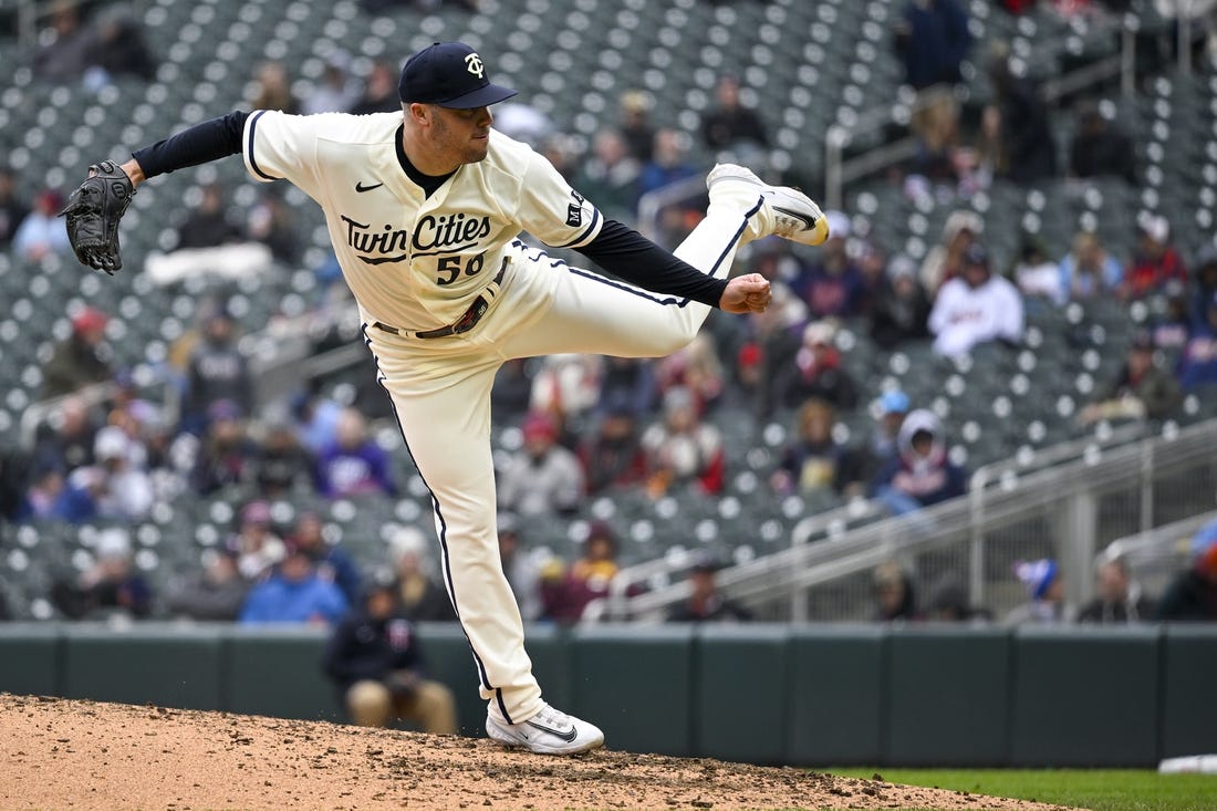 Apr 23, 2023; Minneapolis, Minnesota, USA;  Minnesota Twins pitcher Caleb Thielbar (56) delivers against the Minnesota Twins at Target Field. Mandatory Credit: Nick Wosika-USA TODAY Sports