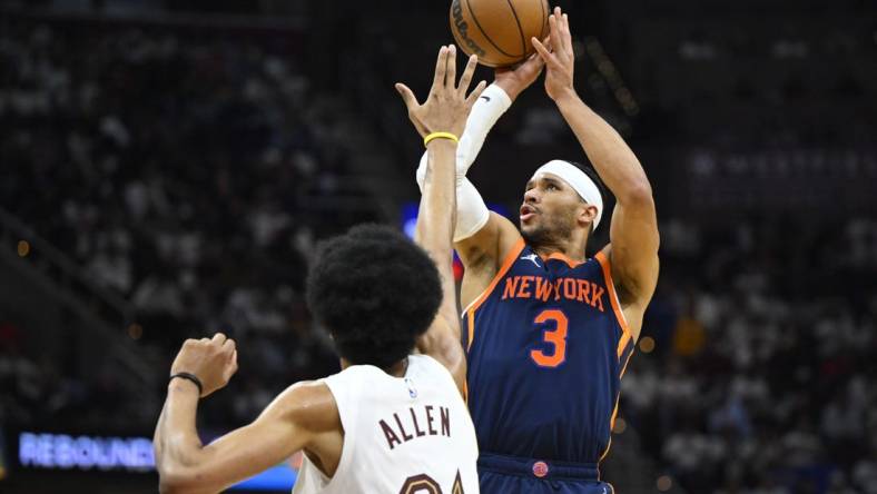 Apr 26, 2023; Cleveland, Ohio, USA; New York Knicks guard Josh Hart (3) shoots beside Cleveland Cavaliers center Jarrett Allen (31) in the third quarter during game five of the 2023 NBA playoffs at Rocket Mortgage FieldHouse. Mandatory Credit: David Richard-USA TODAY Sports