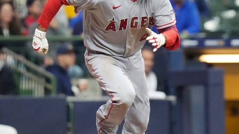 Angels third baseman Anthony Rendon (6) hits a single to center during the fourth inning of the game against the Brewers on Friday April 28, 2023 at American Family Field in Milwaukee, Wis.