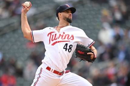 Apr 29, 2023; Minneapolis, Minnesota, USA; Minnesota Twins relief pitcher Jorge Lopez (48) throws a pitch against the Kansas City Royals during the eighth inning at Target Field. Mandatory Credit: Jeffrey Becker-USA TODAY Sports