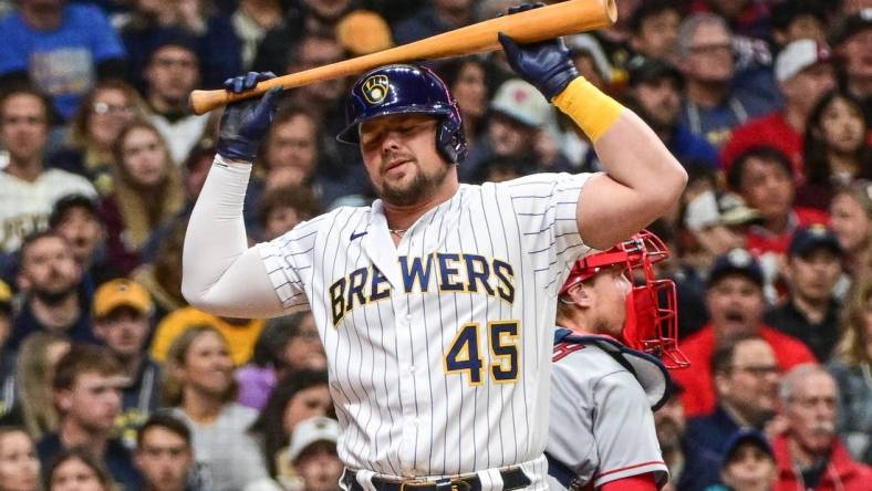 Apr 29, 2023; Milwaukee, Wisconsin, USA; Milwaukee Brewers first baseman Luke Voit (45) reacts after being called out on strikes against the Los Angeles Angels in the second inning at American Family Field. Mandatory Credit: Benny Sieu-USA TODAY Sports