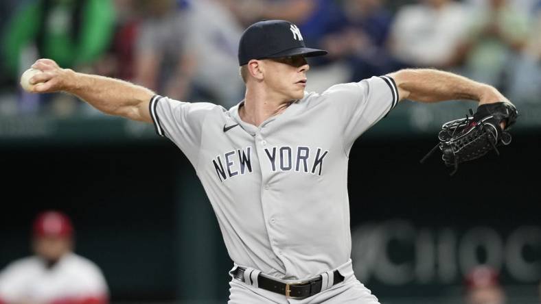 Apr 29, 2023; Arlington, Texas, USA; New York Yankees relief pitcher Ian Hamilton (71) throws against the Texas Rangers during the seventh inning at Globe Life Field. Mandatory Credit: Jim Cowsert-USA TODAY Sports