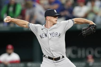 Apr 29, 2023; Arlington, Texas, USA; New York Yankees relief pitcher Ian Hamilton (71) throws against the Texas Rangers during the seventh inning at Globe Life Field. Mandatory Credit: Jim Cowsert-USA TODAY Sports