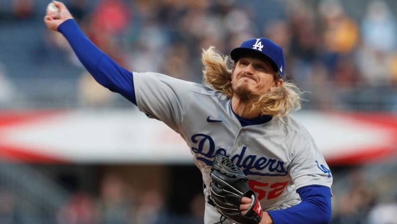 Apr 26, 2023; Pittsburgh, Pennsylvania, USA;  Los Angeles Dodgers relief pitcher Phil Bickford (52) pitches against the Pittsburgh Pirates during the fourth inning at PNC Park. Mandatory Credit: Charles LeClaire-USA TODAY Sports