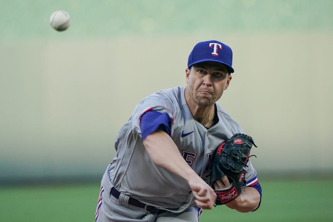 Apr 17, 2023; Kansas City, Missouri, USA; Texas Rangers starting pitcher Jacob deGrom (48) throws a warm up pitch against the Kansas City Royals during the game at Kauffman Stadium. Mandatory Credit: Denny Medley-USA TODAY Sports