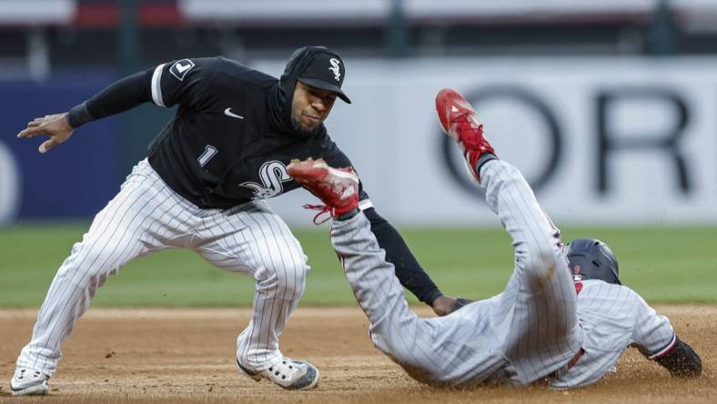 May 2, 2023; Chicago, Illinois, USA; Minnesota Twins left fielder Trevor Larnach (9) is caught stealing second base by Chicago White Sox shortstop Elvis Andrus (1) during the fourth inning at Guaranteed Rate Field. Mandatory Credit: Kamil Krzaczynski-USA TODAY Sports