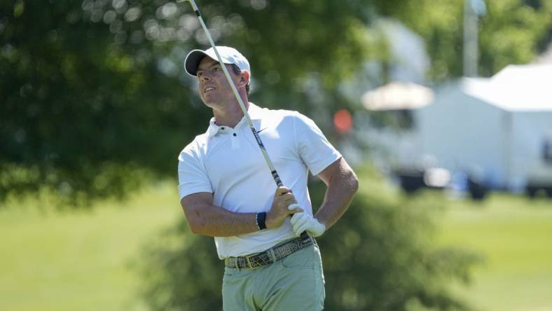 May 4, 2023; Charlotte, North Carolina, USA; Rory McIlroy watches his shot from the third fairway during the first round of the Wells Fargo Championship golf tournament. Mandatory Credit: Jim Dedmon-USA TODAY Sports