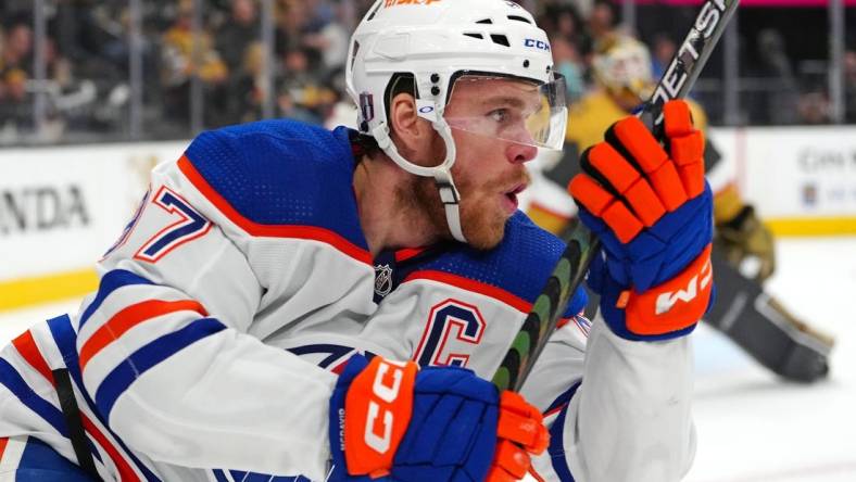 May 6, 2023; Las Vegas, Nevada, USA; Edmonton Oilers center Connor McDavid (97) celebrates after scoring a goal against the Vegas Golden Knights during the first period of game two of the second round of the 2023 Stanley Cup Playoffs at T-Mobile Arena. Mandatory Credit: Stephen R. Sylvanie-USA TODAY Sports